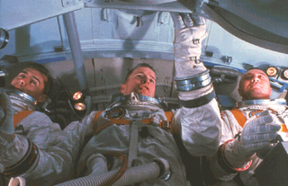 Chaffee, White, and Grissom training in a Command Module simulator on January 19, 1967 (NASA)